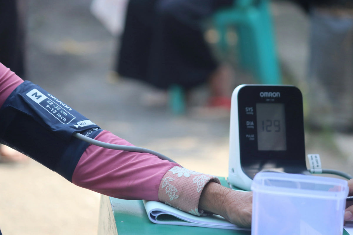 person getting their blood pressure read