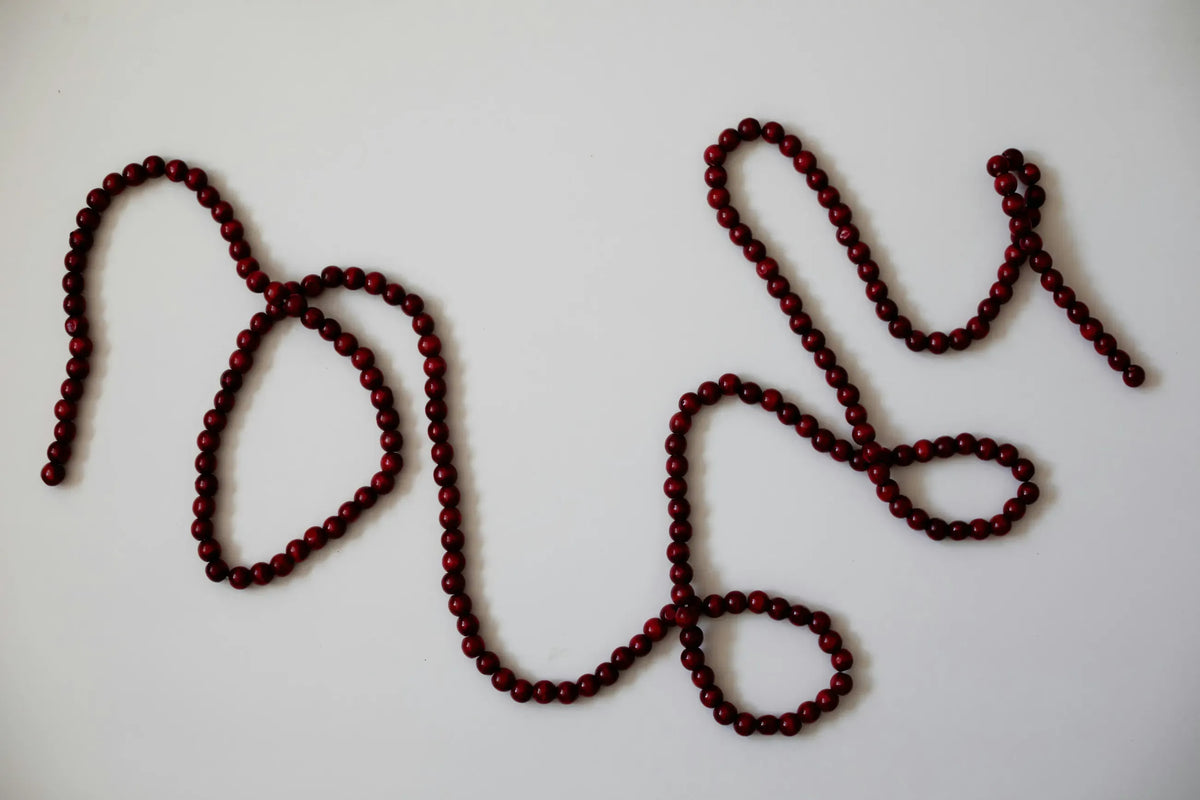 string beads on a white background