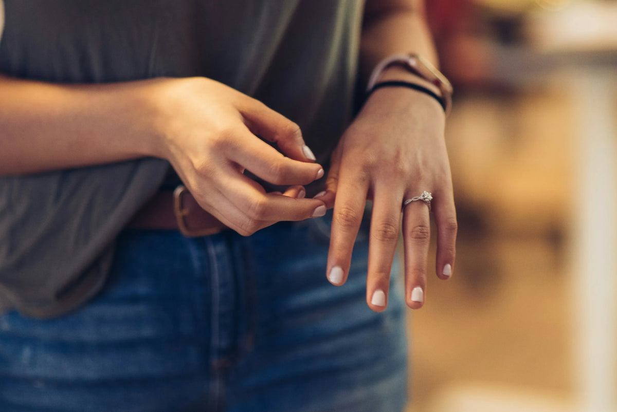 woman's stomach with her hands held out in front