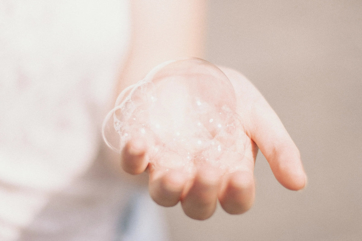 person holding foam in their hand
