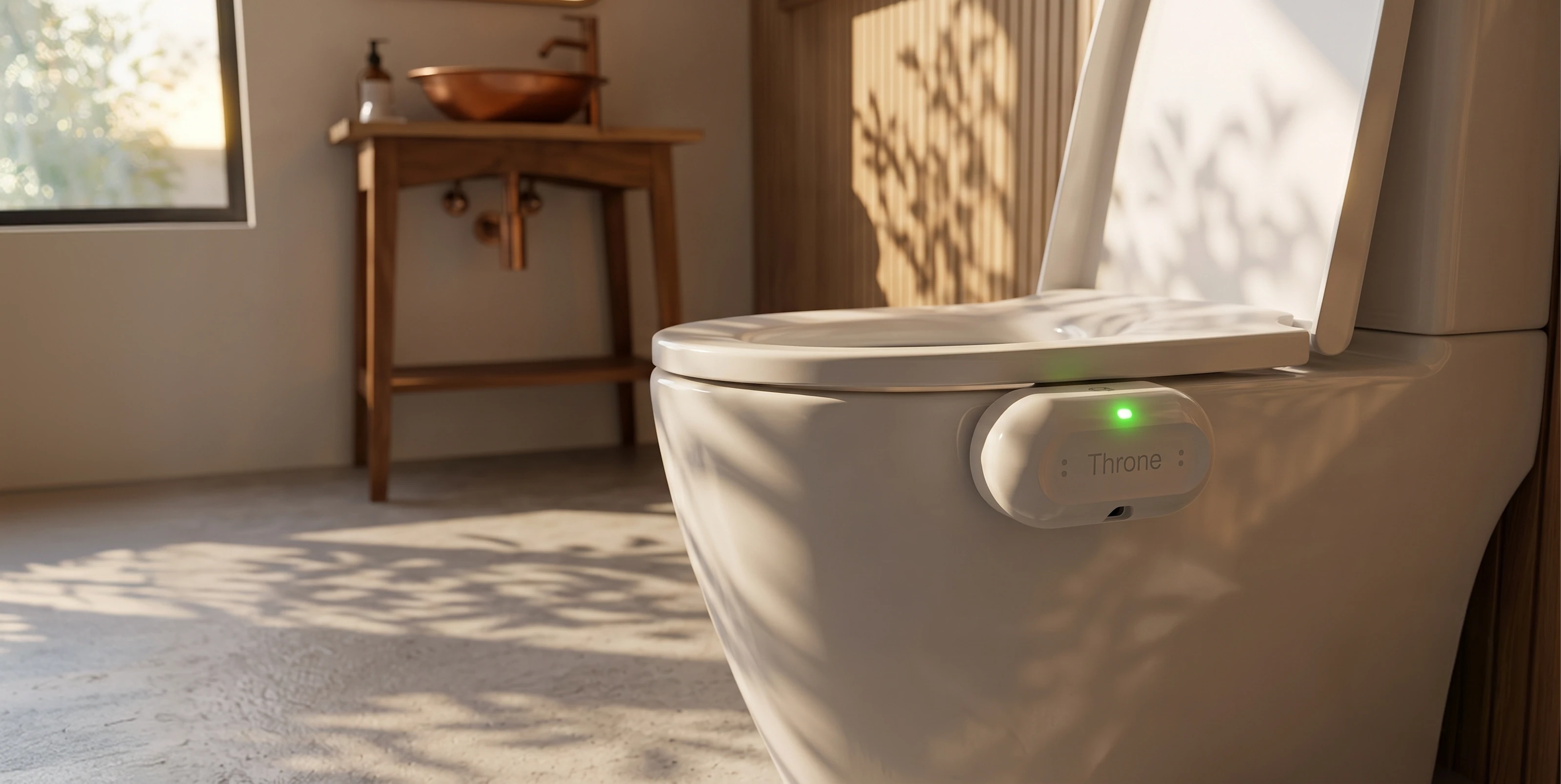 The Throne sensor clipped to a toilet in warm evening light